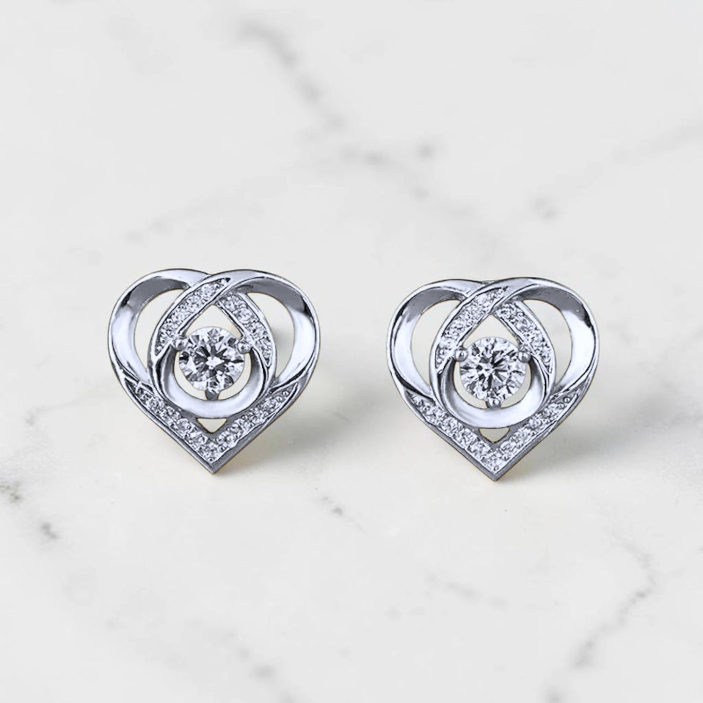 Aurae Moissanite Dancing Heart Stud Earrings S925 Sterling Silver D VVS1 lifestyle worn shot
