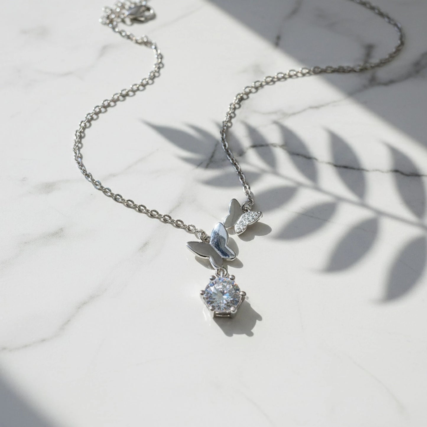 Aurae 1ct Moissanite Butterfly Pendant Necklace S925 Sterling Silver D VVS1 detail close-up shot