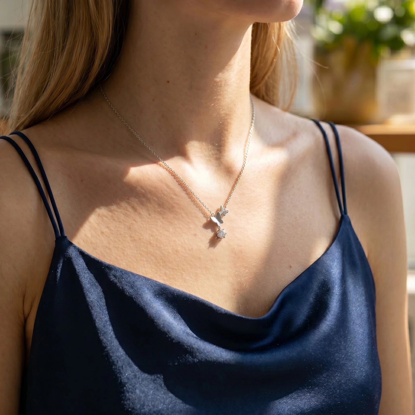Aurae 1ct Moissanite Butterfly Pendant Necklace S925 Sterling Silver D VVS1 lifestyle worn shot