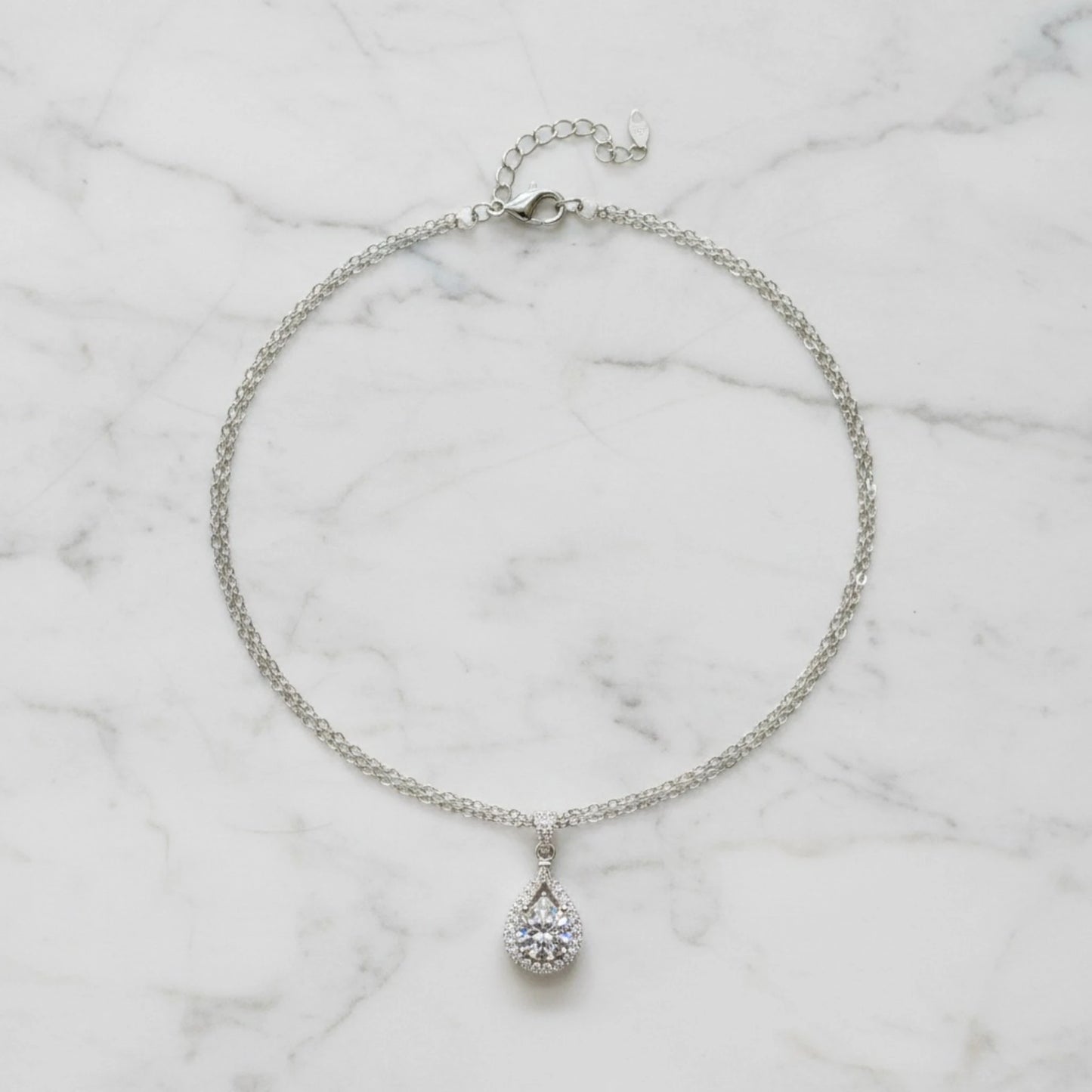 Aurae Moissanite Pear-Shaped Teardrop Halo Pendant Necklace S925 Sterling Silver detail close-up shot