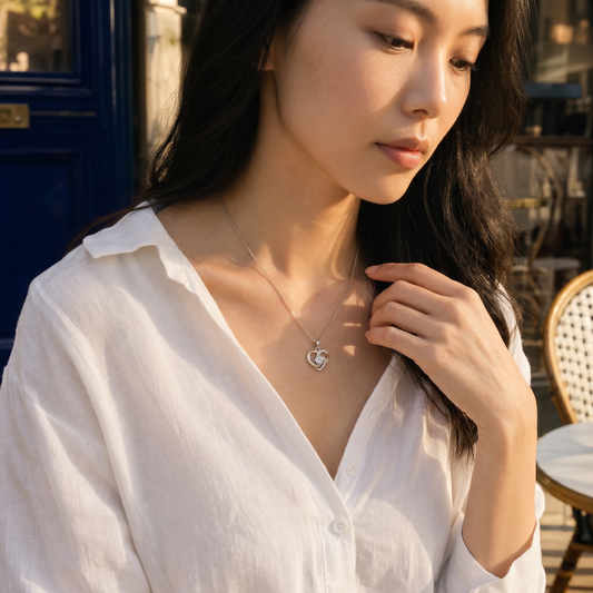 Aurae Moissanite Dancing Heart Pendant Necklace S925 Sterling Silver D VVS1 side angle view