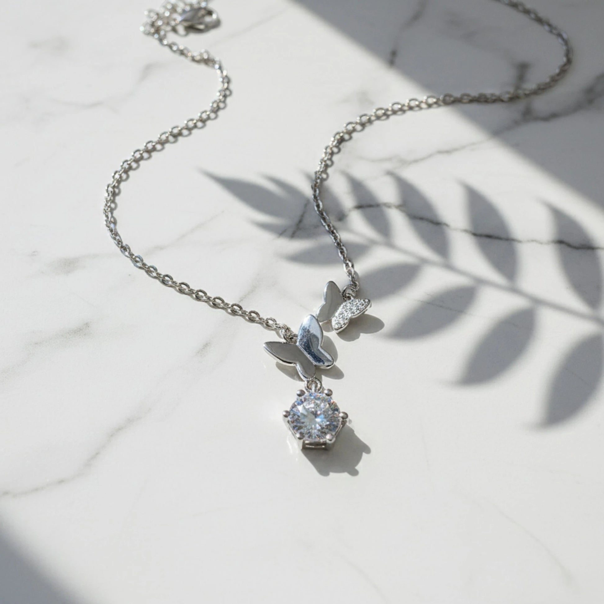 Aurae 1ct Moissanite Butterfly Pendant Necklace S925 Sterling Silver D VVS1 detail close-up shot