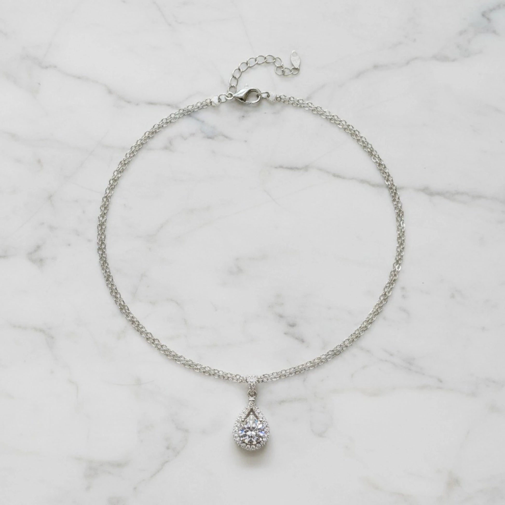 Aurae Moissanite Pear-Shaped Teardrop Halo Pendant Necklace S925 Sterling Silver detail close-up shot