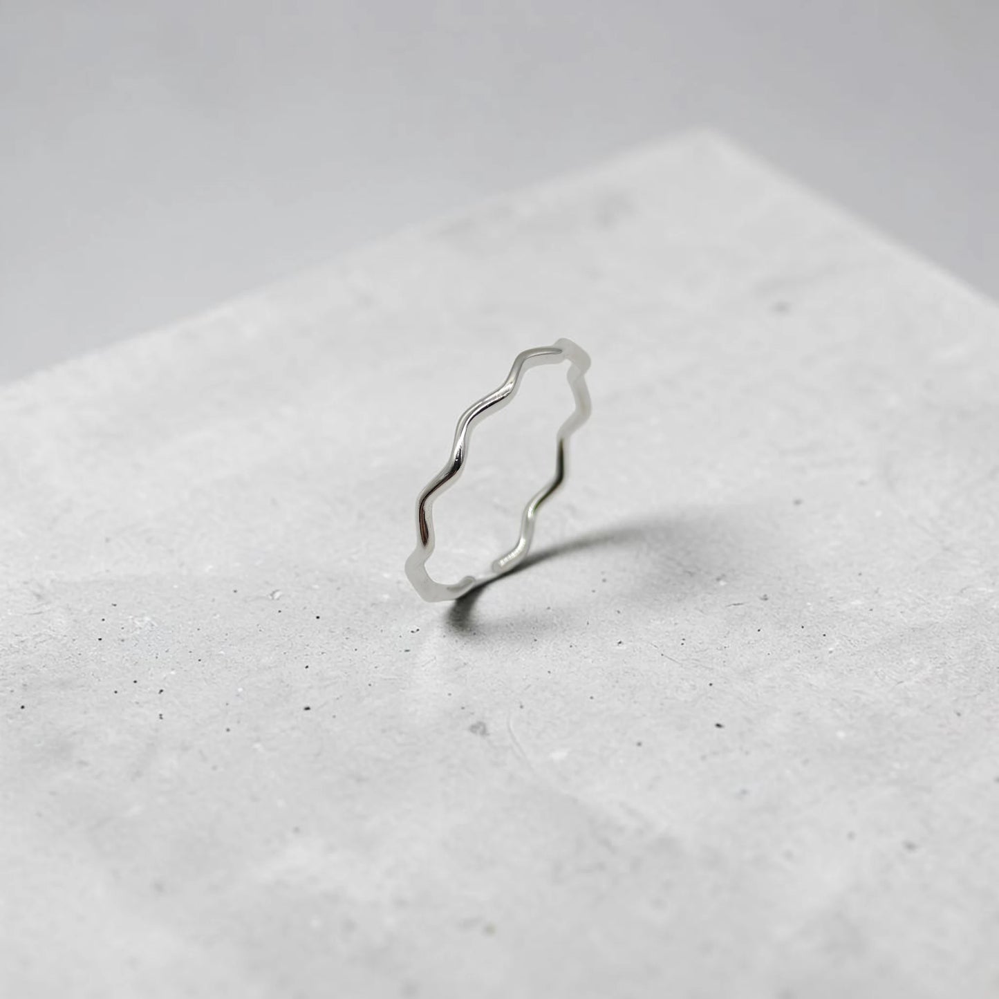 Elegant Wave Curve Ring